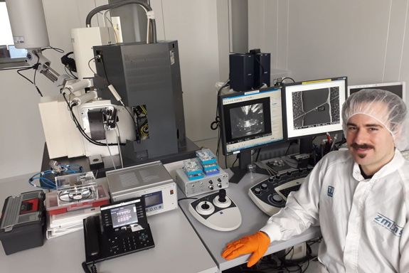 scientist wearing protecitve gear in the lab