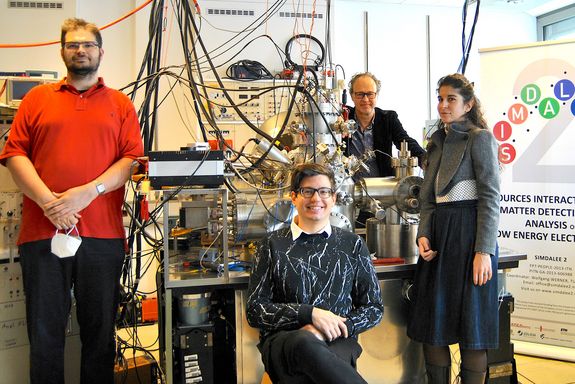 Four people in the lab