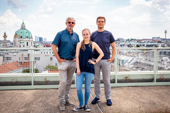 three people on the roof of TU Wien
