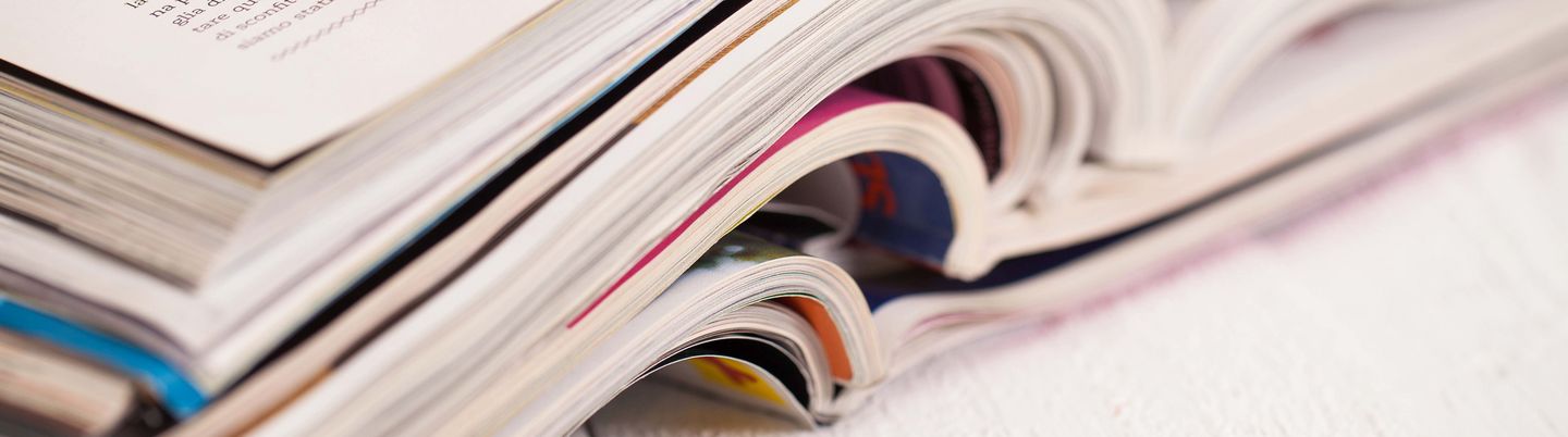 Several journals lying open