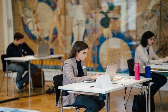 students working on laptops