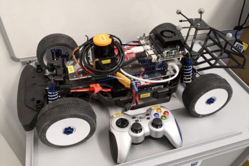 Model race car with remote controller for human interaction