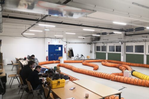 Autonomous driving lab with race track for model racing car